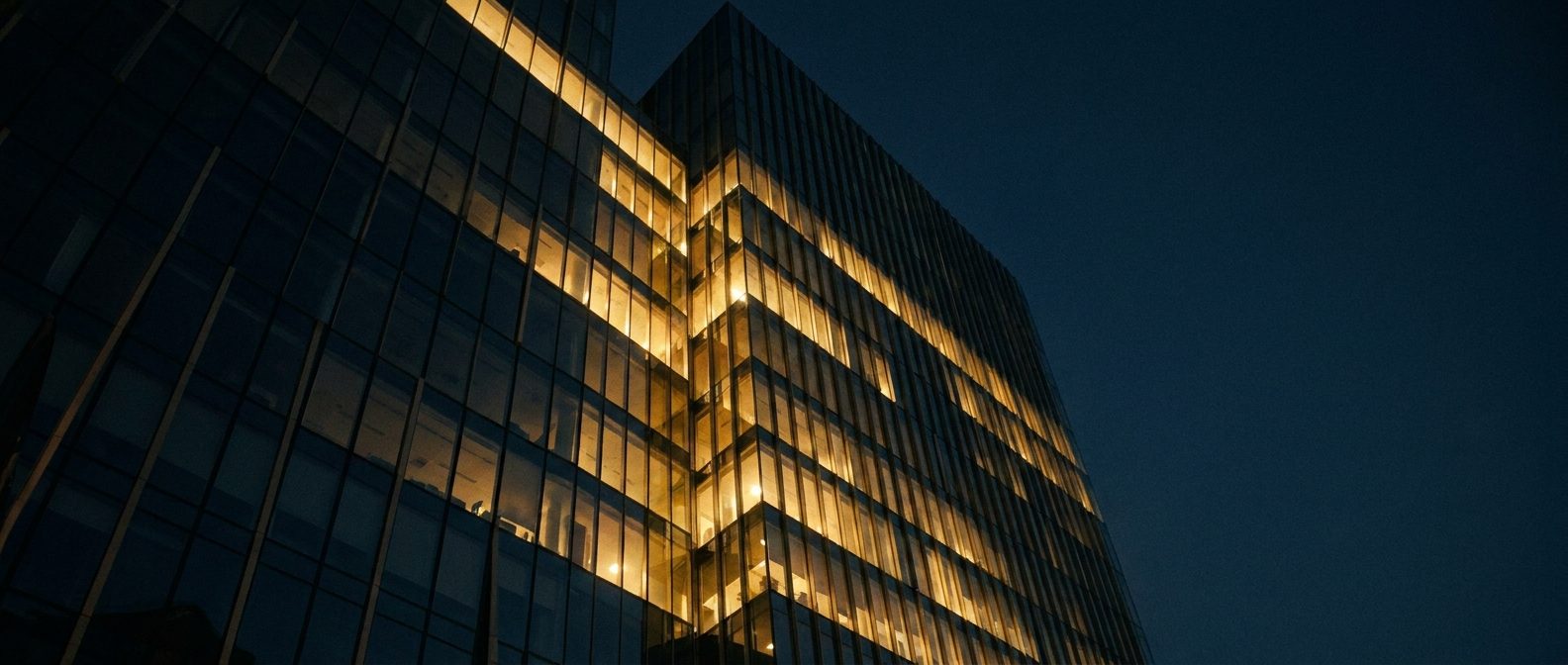 Modern corporate architecture at dusk